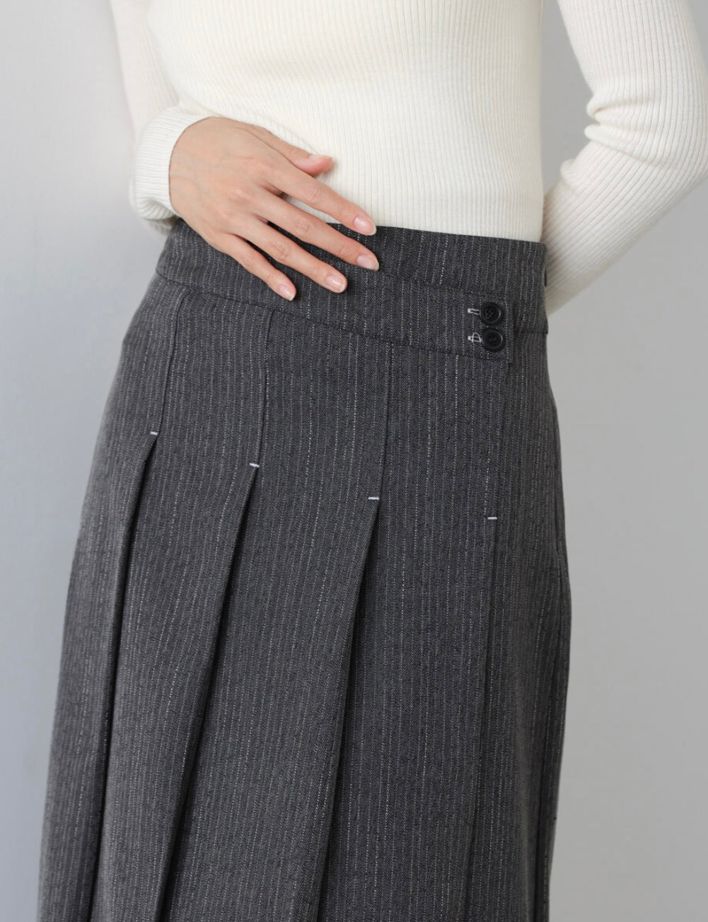 Bab Pinstripe Pleated Skirt with Diagonal Buttons