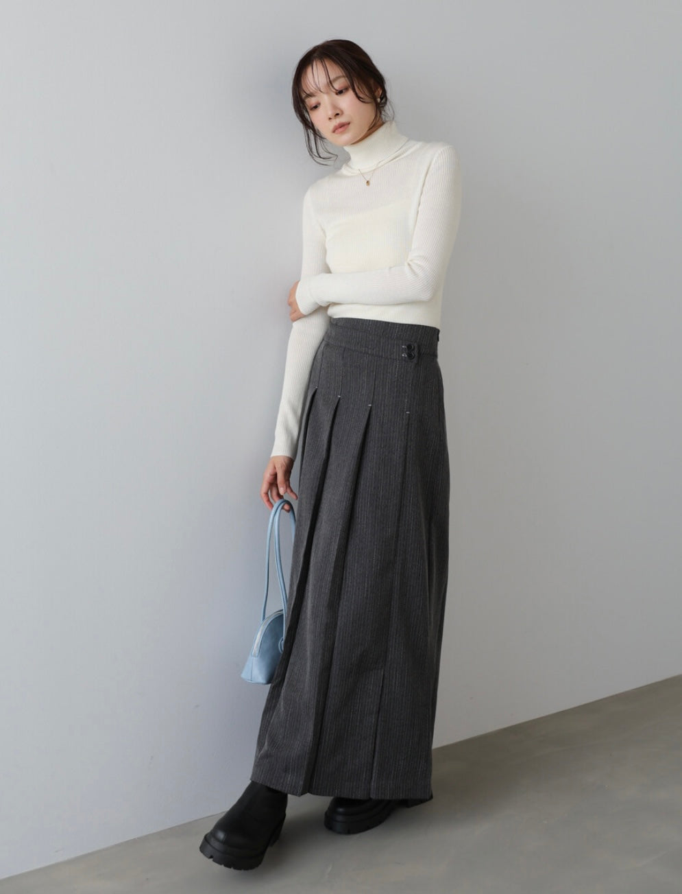 Bab Pinstripe Pleated Skirt with Diagonal Buttons
