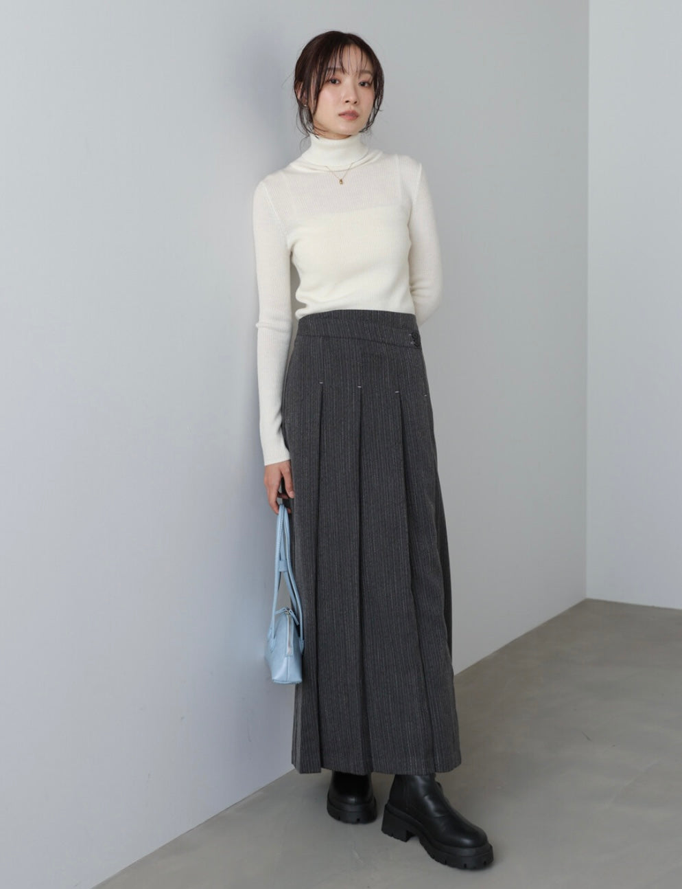 Bab Pinstripe Pleated Skirt with Diagonal Buttons