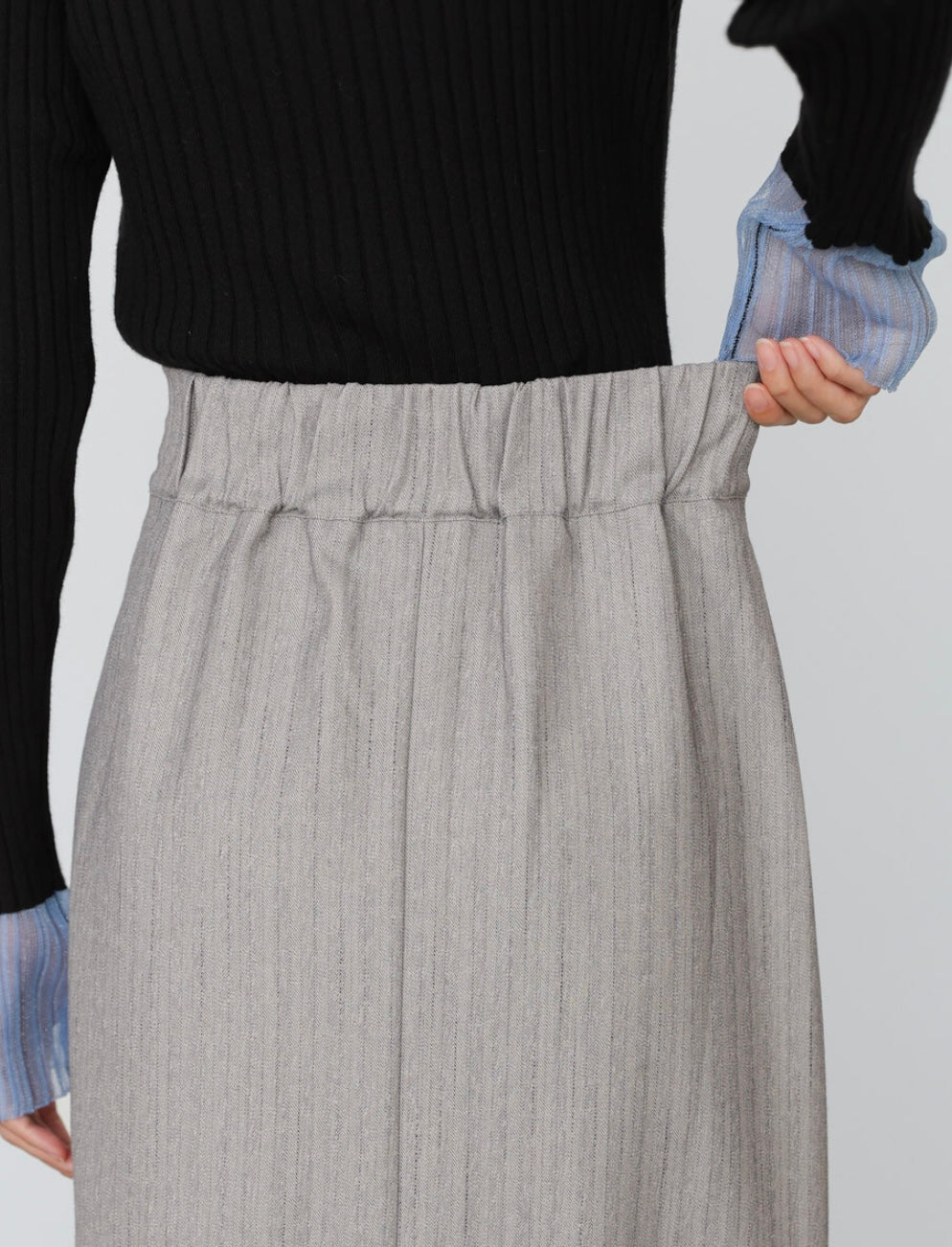 Bab Pinstripe Pleated Skirt with Diagonal Buttons